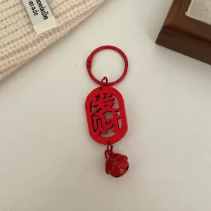 Roter Holzschlüsselanhänger mit chinesischem Segenszeichen und Glöckchen für Neujahrsgeschenk
