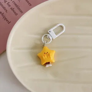 Cute cartoon star keychain and bag pendant, adorable student backpack accessory gift.