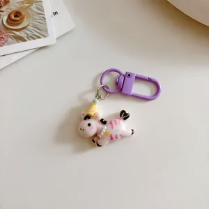 Cute cartoon running pony keychain bag charm, pink cute design with purple clasp for students.