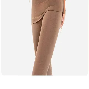 Close-up detail of thermal underwear pants, seamless brown stretch knit fabric for cold weather.