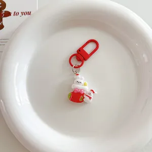 Christmas cartoon rabbit snowman keychain pendant, cute bag charm and holiday gift accessory detail.