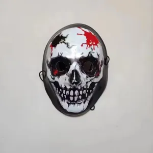 Halloween scary skull mask detail shot, white black red blood design for party cosplay prop.