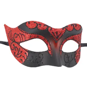 Close-up detail of the red and black glitter masquerade mask with exquisite painted patterns.
