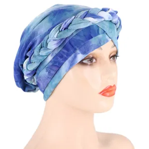 Side view detail of a blue tie-dye braided turban hat, soft milk silk fabric head wrap.