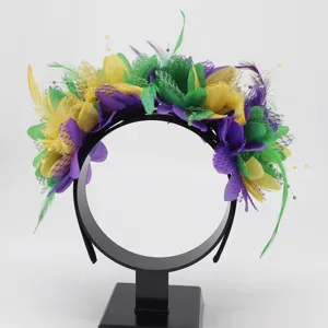 Detailed view of colorful feather flower headband with purple green yellow decorations for party.