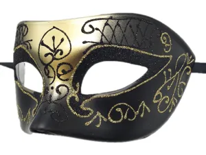 Close-up detail of the black and gold masquerade mask with glittering swirl patterns.