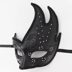 Black Venetian masquerade mask detail, elegant flame feather design with sparkling glitter finish.