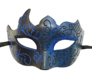 Detail view of the black and blue masquerade mask with glitter horn and lace patterns for party.