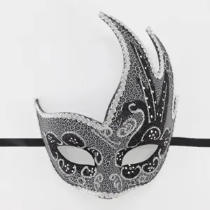 Venetian masquerade mask detail showing black and silver flame curved horn swan design.