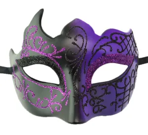 Exquisite black and purple masquerade mask detail showcasing glitter and horn design.