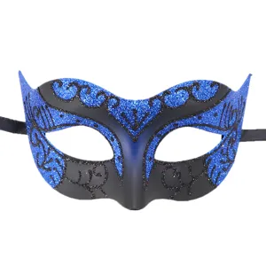 Venetian masquerade mask detail showing blue glitter patterns and black strap for party.