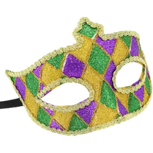 Masquerade mask detail showing green purple gold glitter diamond pattern and gold trim.