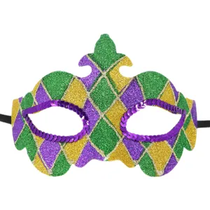 Detailed view of the sparkling Mardi Gras masquerade mask with colorful glitter and purple sequins.