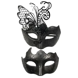Exquisite black masquerade couple masks with metal butterfly filigree and glitter details.