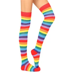 Rainbow striped over the knee socks detail view, vibrant colorful long stockings for women.