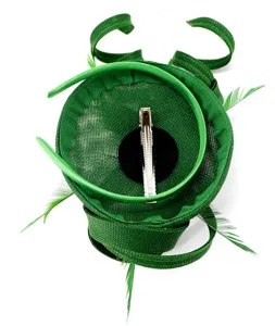 Emerald green fascinator hat detail view, featuring sinamay mesh, headband and hair clip.