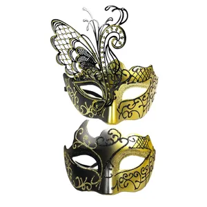 Close-up details of black gold metal butterfly masquerade mask set for party and holiday.