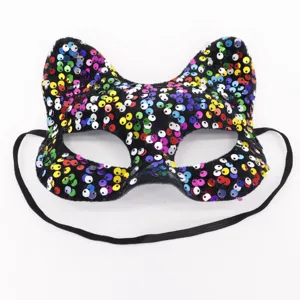 Close-up detail of a sparkly sequin fox mask with elastic band for party and Halloween events.
