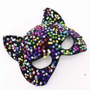 Detailed view of the sparkling sequin cat mask for masquerade parties and Halloween events.