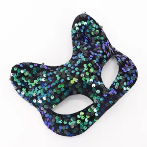Close-up of sparkling sequin masquerade cat mask, ideal for costume party and holiday events.