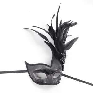 Black masquerade mask with feather and sparkle for party costume event accessory detail item