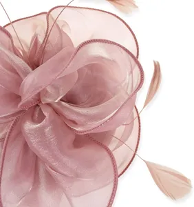 Exquisite organza feather fascinator detail, elegant pink hair accessory for party and cocktail events.