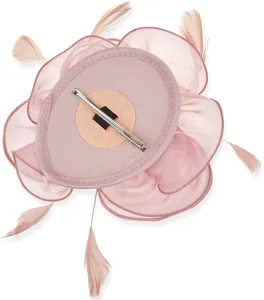 Detail view of pink organza flower fascinator back, showing hair clip and feather decor.