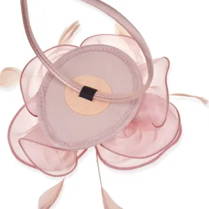 Pink organza feather fascinator detail view, elegant hair accessory for cocktail parties.