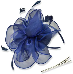 Detailed view of dark blue organza feather fascinator and hair clip showing delicate mesh texture.