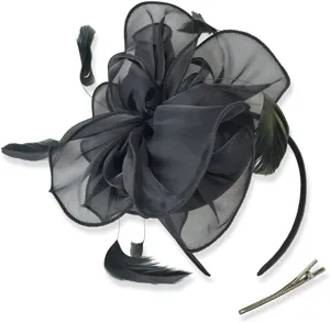 Detailed close-up view of black organza flower fascinator headband with feather accessories.