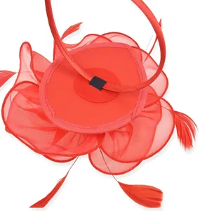 Red organza feather fascinator detail view, elegant hair accessory for parties and cocktail events.