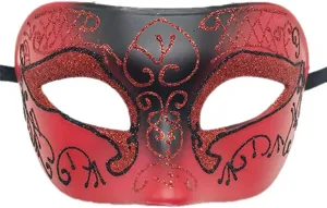 Primo piano di una maschera da festa rossa e nera con glitter, motivi raffinati e scritte corsive.