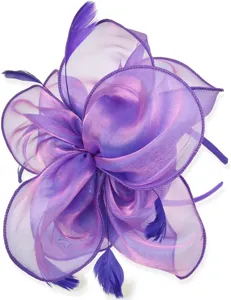 Purple organza hair fascinator detail showing sheer layered flower petals and delicate feathers.