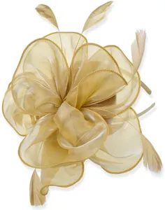 Detail view of luxury champagne organza feather fascinator headband for cocktail party.