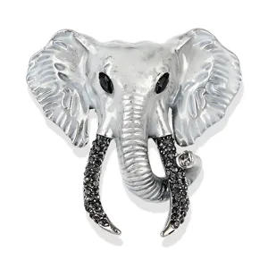 Elephant head brooch detail shot, showing white enamel finish and shimmering black rhinestones.