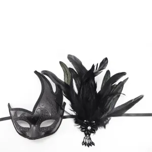 Exquisite black masquerade mask with glitter details and dramatic feather headpiece for party.