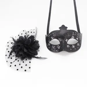 Elegant black masquerade mask with glitter details and matching mesh flower fascinator