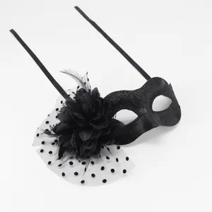 Black masquerade mask with mesh, feathers, and floral decoration for Halloween party events.