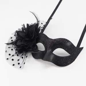 Black masquerade mask with mesh flower and feathers for Halloween party dress up events.