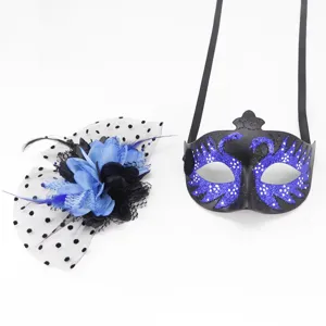 Detail view of a blue and black swan masquerade mask with matching floral fascinator