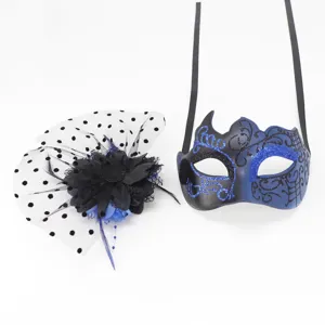 Detail view of blue glitter masquerade mask and mesh flower fascinator set