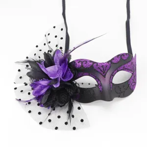 Elegant purple and black masquerade mask with decorative floral lace and polka dot mesh