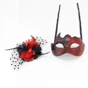 Red and black masquerade mask with matching polka dot mesh feather flower hairpiece
