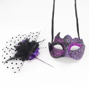 Detail view of purple masquerade mask and matching polka dot veil hair clip