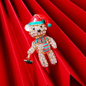 Christmas bear rhinestone brooch detail shot, fashion holiday jewelry accessory for women.