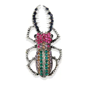 Vintage rhinestone beetle brooch pin, silver-toned alloy crystal insect lapel jewelry.