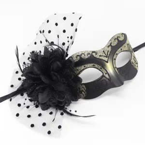 Masquerade mask black with gold glitter, mesh veil and black flower for party and festival.