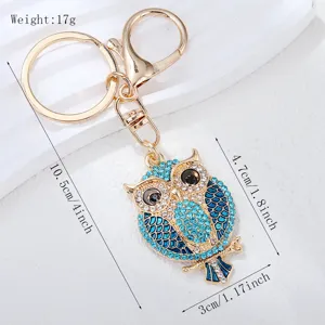 Goldfarbener Strass Eulen Schlüsselanhänger süßer blauer Kristall Taschen Anhänger für Damen.