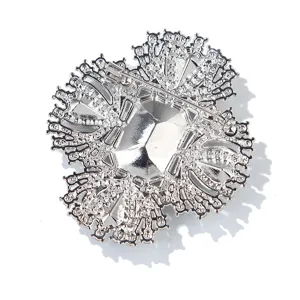 Detailed view of the silver-tone vintage crystal brooch back with secure pin clasp mechanism.