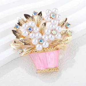 Exquisite pearl flower basket brooch with colorful rhinestones, delicate gold-tone enamel detail.